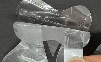 Easy-peel tab for decals