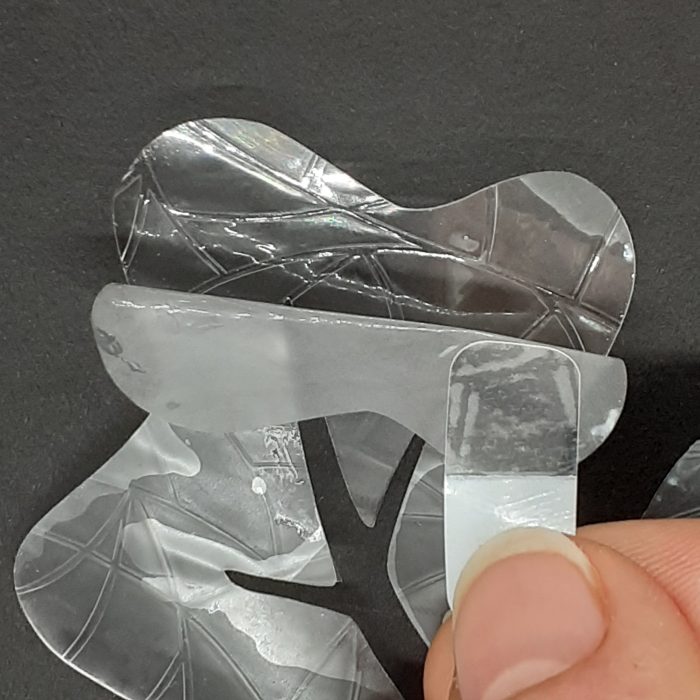 Easy-peel tab for decals