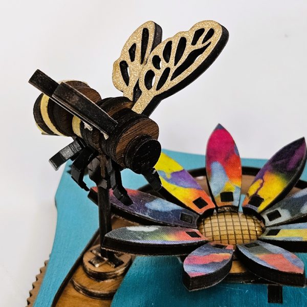 Detail of bee and flower on Fridget spinnger